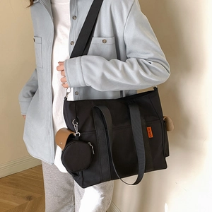 Black large nylon tote bag with brown pocket and round coin purse for women