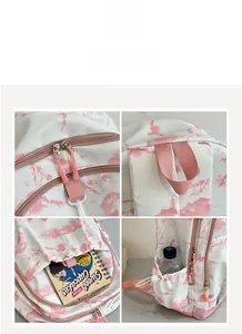 Détails du sac à dos paysage rose avec double fermeture éclair et poche latérale
