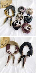 Close-up of lightweight cotton linen neckerchiefs featuring delicate lace trim details