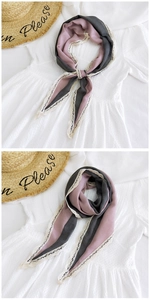 Detail of color-block cotton linen scarf with elegant white lace trim for women