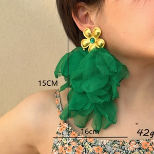 Handmade oversized green floral fringe earrings with gold finish and vibrant tulle petals