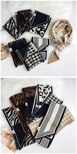 Detail of leopard and zebra pattern knitted scarves with signature H logo labels