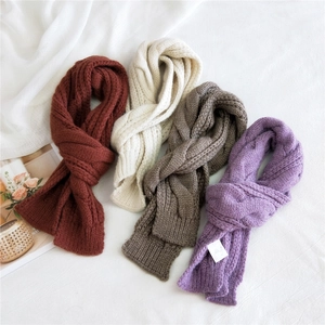 Knitted scarves in deep red, beige, coffee grey and light purple with cable textures