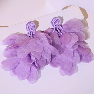 Detailed view of handmade purple fabric flower tassel earrings with intricate beadwork