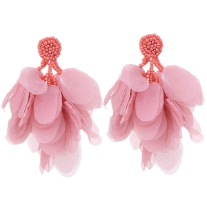 Detailed close-up of pink fabric petal tassel earrings with delicate beaded studs