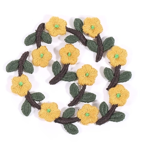 Set of 10 yellow embroidered flower patches with green leaves for DIY hair accessories