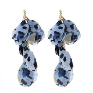 Detail of blue leopard print fabric petal drop earrings with gold metal stud