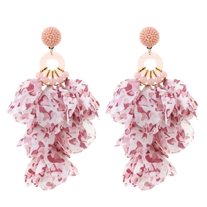Bohemian style pink fabric petal fringe earrings with beaded studs on white background