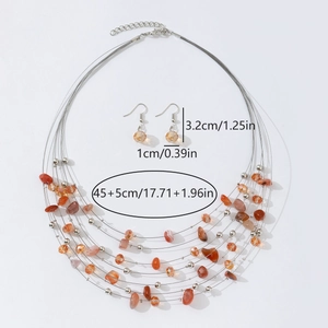 Detail of bohemian necklace set with orange gravel stones and silver beads specifications