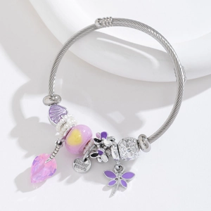 Stainless steel wire bracelet with purple dragonfly charms and pink crystal leaf pendants