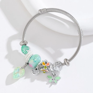 Adjustable stainless steel wire bracelet with dragonfly charms and green floral beads