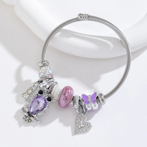Silver stainless steel bangle with purple owl, heart pendant and crystal beads