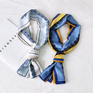 Elegant skinny silk scarves with leopard print and lace edges in blue and navy tones