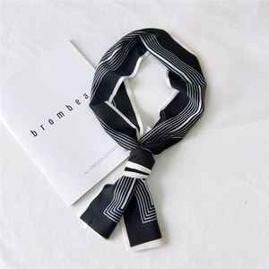 Elegant black and white striped narrow silk scarf with geometric pattern in French style