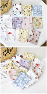 Close-up of cooling arm sleeves with fruit patterns including strawberry and avocado
