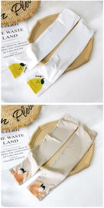 Detail of high-elastic cooling ice silk sun sleeves with lemon and orange prints