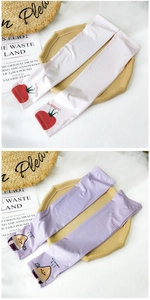 Detail of thin ice silk sun sleeves with fruit patterns and finger holes for summer cooling