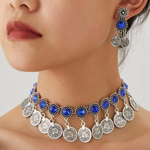 Bohemian crystal coin necklace and earrings set with vintage silver finish on model
