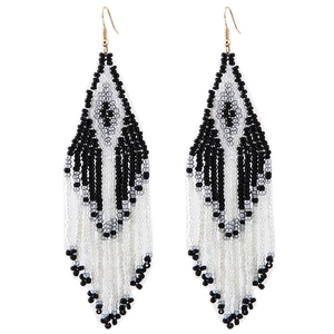 Bohemian long tassel beaded earrings with black and white geometric pattern on white base