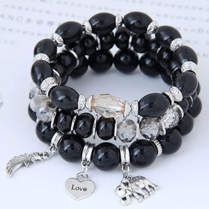 Bohemian 3-layer black beaded bracelet set with silver feather, heart, and elephant charms