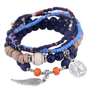 Bohemian multilayer beaded bracelet with silver wing and Paris Eiffel Tower charms