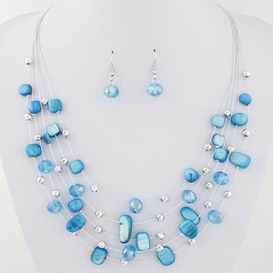 Bohemian multi-layer turquoise shell necklace and earring jewelry set on model