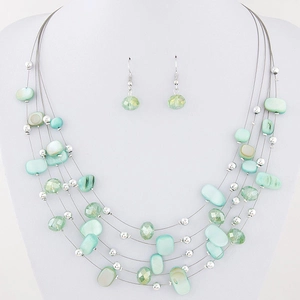 Bohemian multi-layer necklace and earrings set with green shell slices and faceted beads
