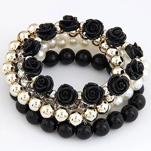Bohemian multilayer stretch bracelet set featuring black resin roses and faux pearls