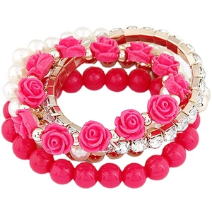 Multilayer elastic bracelet featuring pink rose, pearls, red beads, and rhinestone details