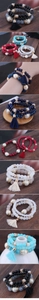 Close-up of bohemian layered beaded elastic bracelet sets with tassels and matte beads