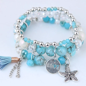 Bracelet bohème multicouche avec pendentif étoile de mer, breloque Love et pompon bleu