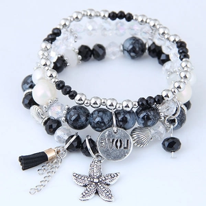 Bracelet bohème multicouche perlé avec breloques étoile de mer coquillage et pompon
