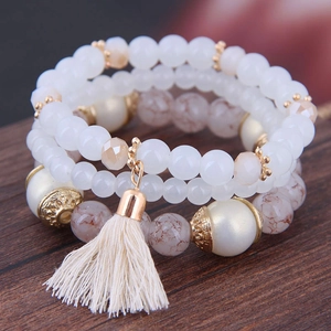Bohemian multi-layer beaded bracelet with marble beads, large pearls and beige tassel
