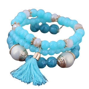 Bohemian multilayer beaded bracelet set with turquoise beads and silk tassel accent