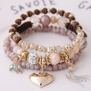 Bohemian multi-layer heart charm bracelet with wooden beads, crystal tassels and gold accents