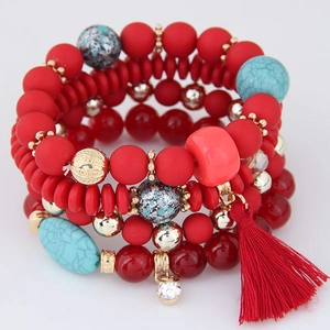 Bohemian multi-layer beaded bracelet with red tassels and blue turquoise accents