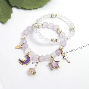 Mehrlagiges Perlenarmband Set mit lila Perlen, Mond, Sternen und Ballerina Anhänger