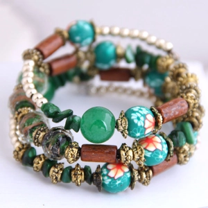 Bohemian multilayer beaded wrap bracelet with turquoise, wood, and vintage metal accents