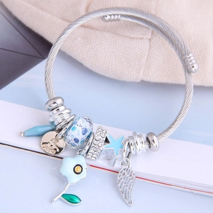 Silver beaded charm bracelet with sunflower and feather pendants on steel wire band