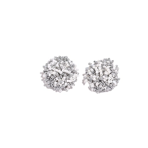 Bohemian style beaded stud earrings with white and silver seed beads in a round cluster