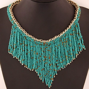 Bohemian multi-layer tassel necklace with gold chains and turquoise beads for women