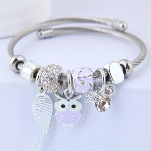 Silver stainless steel bead bracelet featuring lavender owl and white angel wing charms