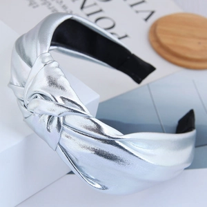 Cerchietto argento metallizzato con design a nodo e trama in tessuto flessibile per donna