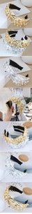 Detail of wide metallic knotted headbands featuring pearl embellishments in gold and silver