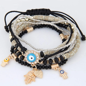 Bohemian multi-layer beaded bracelet with Evil Eye and Hamsa Hand charms on white background