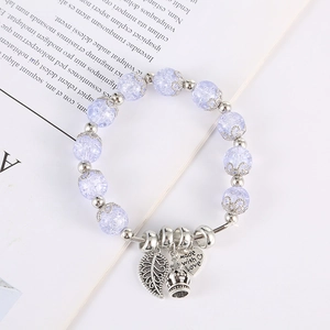 Bracciale di perle di cristallo viola con ciondoli in argento a foglia e corona