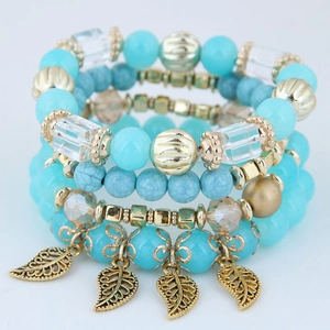 Bohemian multilayer beaded bracelet set with turquoise beads and gold leaf charms