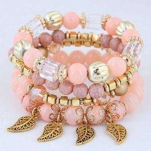 Bohemian multi-layer beaded bracelet set with pink crystals and golden leaf pendants