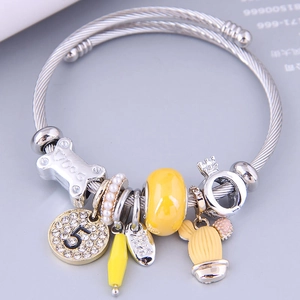 Bracelet ajustable en fil d'acier inoxydable avec glands en cristal et breloque en os