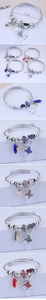 Detailed view of ballet dancer charm bracelet with size specs and multi-color crystal beads